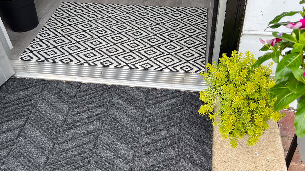 WaterHog Luxe and Neighburly entrance matting enhances a home.