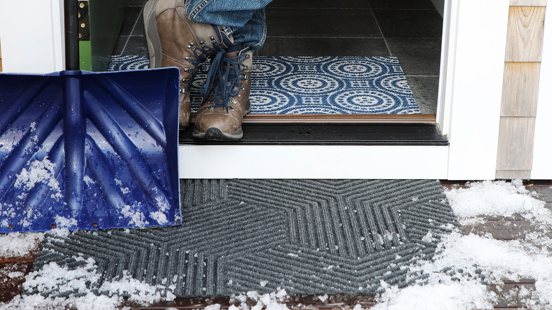 Outdoor doormats, like the WaterHog Luxe, are effective tools to help keep your floors clean and safe while providing a unique look and feel for your front door.
