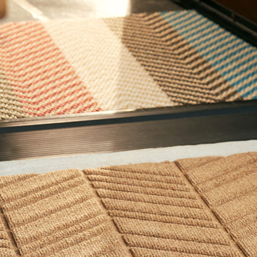 Indoor/outdoor entrance doormats for floor protection.