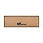 Overhead of double door Around the Block mat personalized with name in script with two black lines around the perimeter.