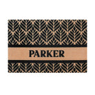 Single door size botanical doormat with coir and black floral print personalized with last name