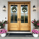 Neighburly's Corner Lot in black personalized with a last name featured in double door at the entrance of a house.