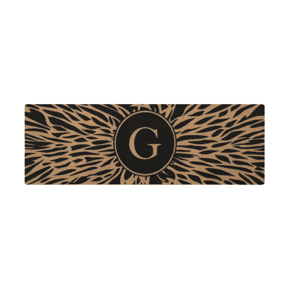 Overhead double door Dahlia mat centered monogrammed G abstract line around it, black and coir