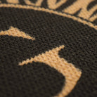 Detail shot of Dahlia mat’s black and coir, no shed surface