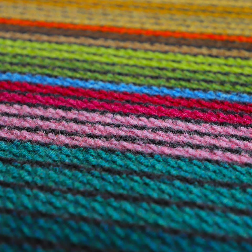 Bright colored doormat is water resistant and will not rot or shed like coir mats.