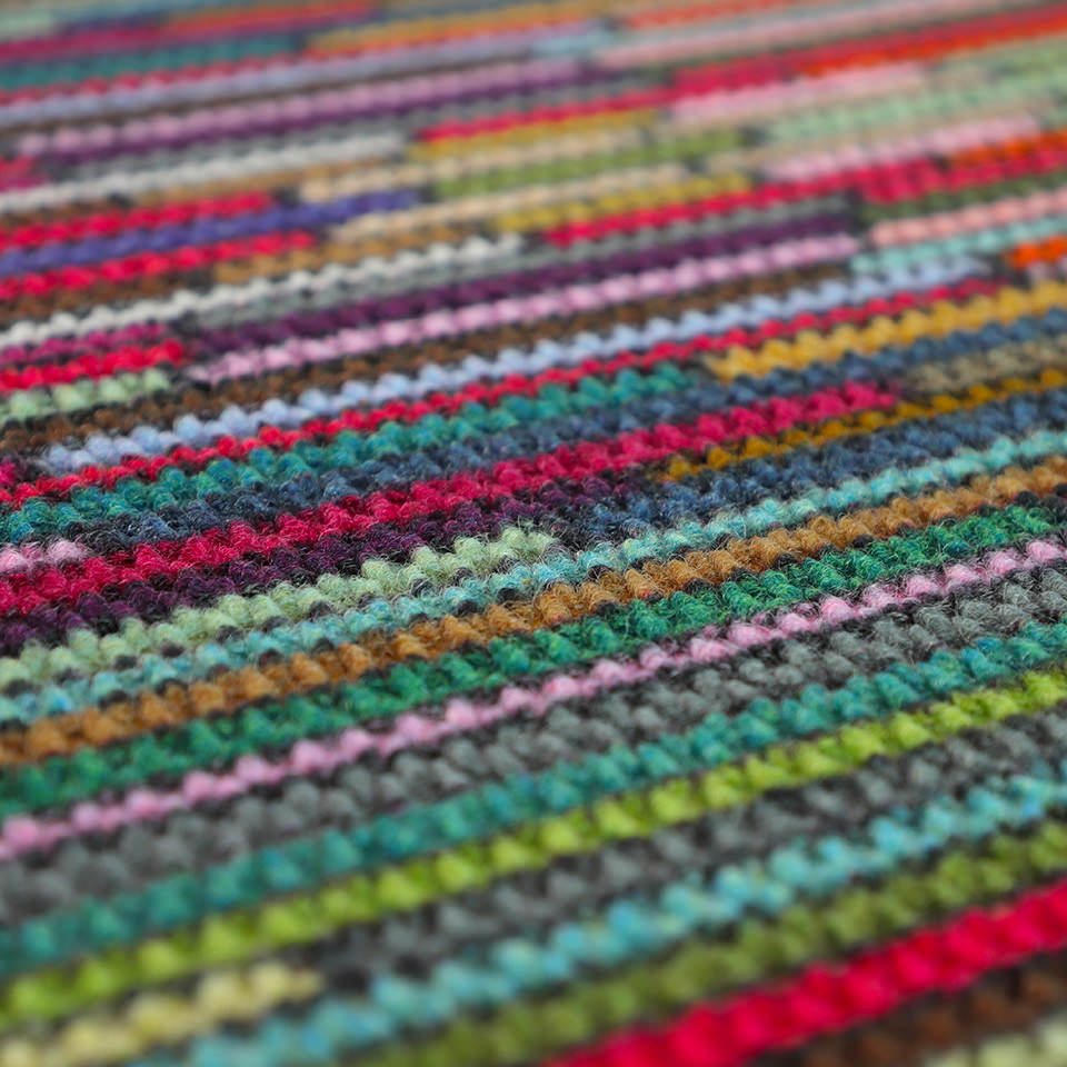 Fun and colorful doormat features a textured surface that make it the ideal doormat to wipe shoes clean.