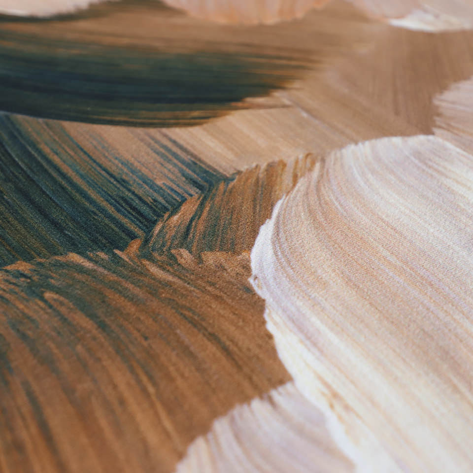 Close up view of abstract painting printed on low profile washable floor mat in rust, cream colors, and dark teal