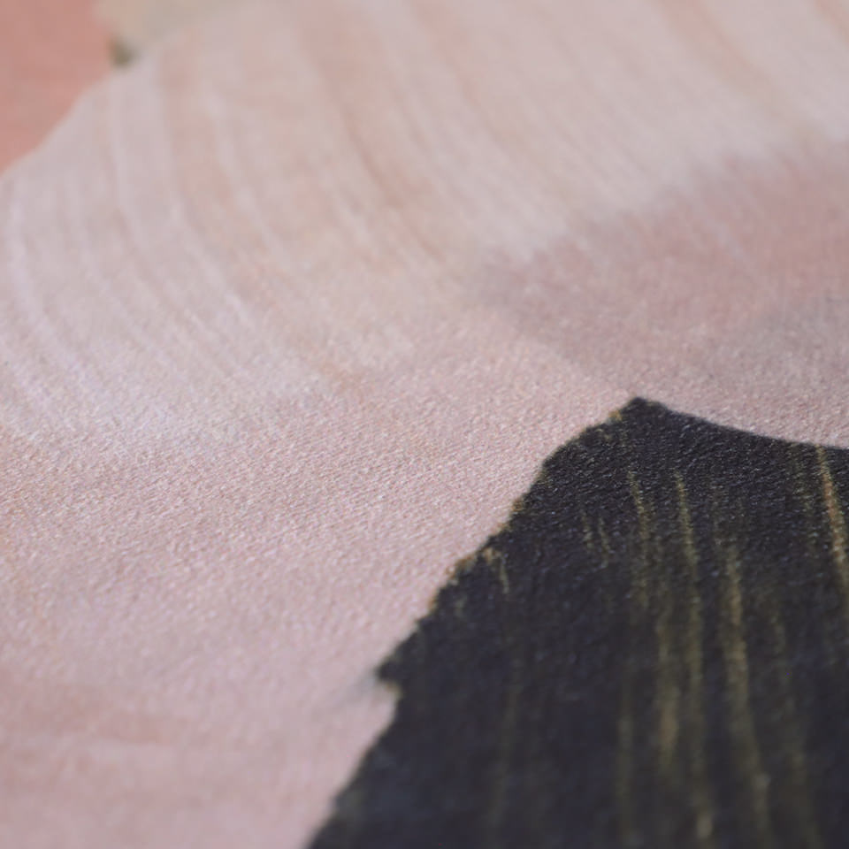 Close up of abstract painting printed on low profile floor mat in greens, pinks, and creams