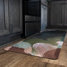 Happy Feet runner shown in Secret Garden design, brush strokes of deep blues and jades paired with bright greens and pinks