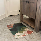 Abstract Floral Secret Garden anti-fatigue mat in a bathroom in front of a vanity for standing relief