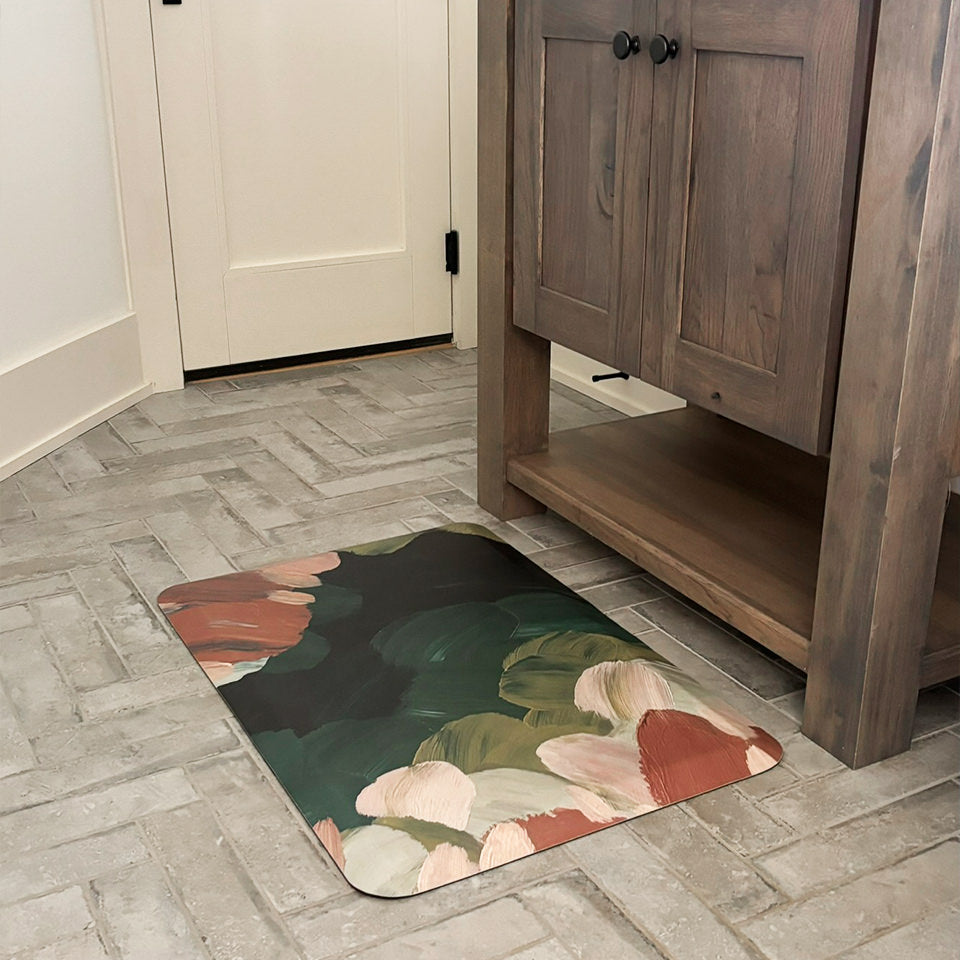 Abstract Floral Secret Garden anti-fatigue mat in a bathroom in front of a vanity for standing relief