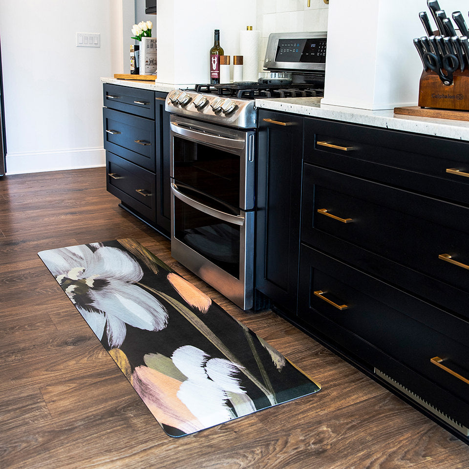 Extremely comfortable anti-fatigue Happy Feet runner, floral design matching the dark kitchen cabinets.