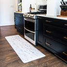 Beautiful, high-resolution printed marble design on a comfortable anti-fatigue runner mat with a wipeable surface