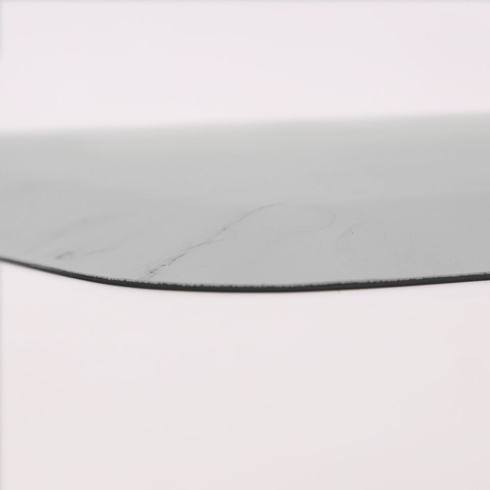 Up close corner image of the Marble Happy Feet anti-fatigue mat, showing off the classic grey-on-white modern marble design.