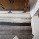 Happy Feet's Moody Hues anti-fatigue bath mat depicting field scene in white, black, and greys.