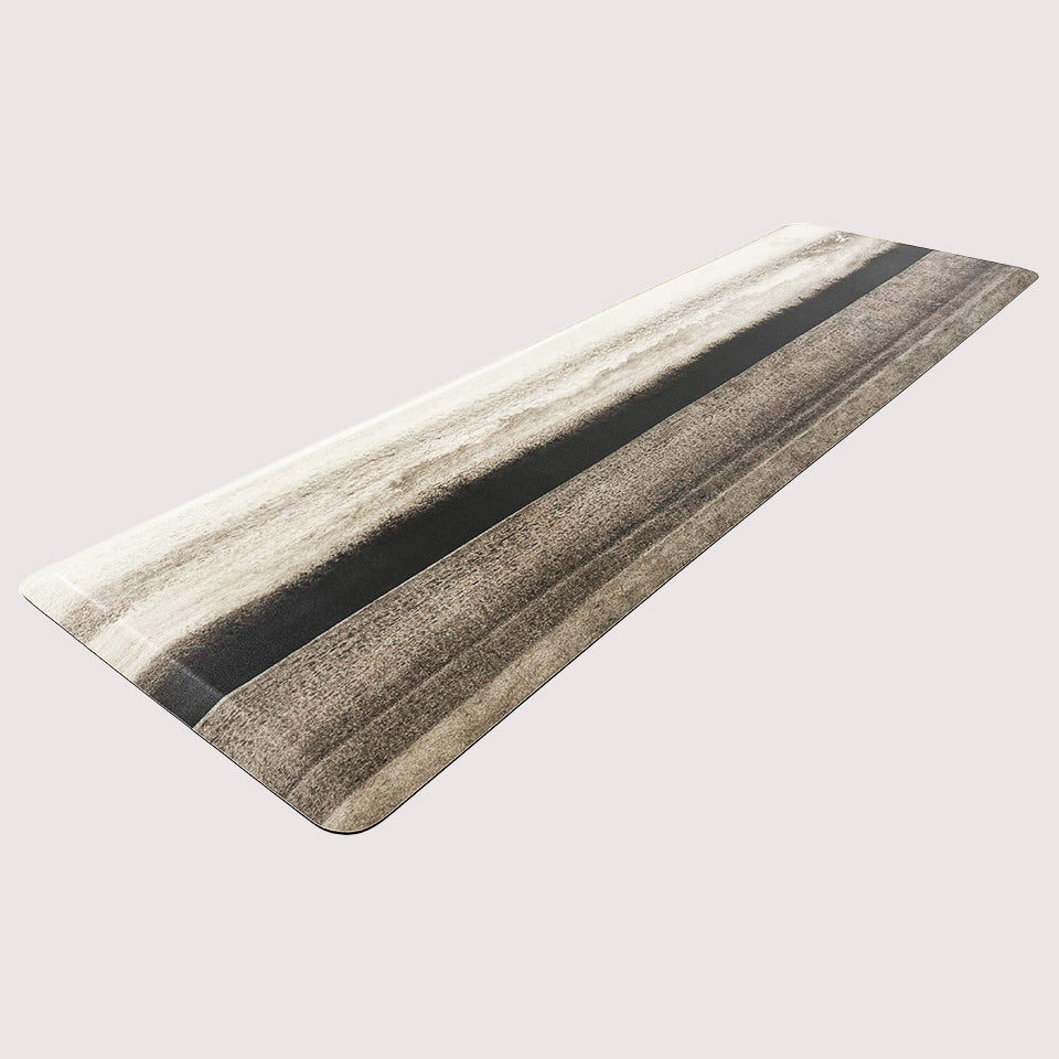 Moody Hues runner mat high-definition landscape design on a wipeable surface and incredibly comfortable foam for standing comfort.