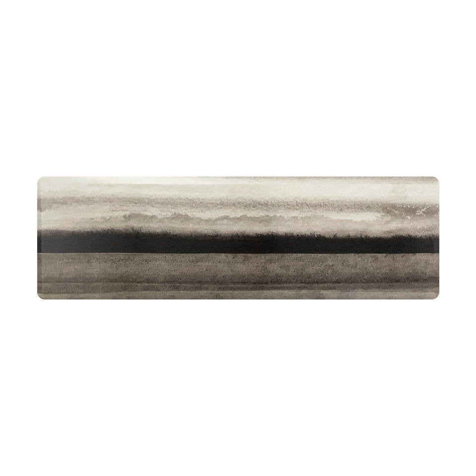 Overhead of Moody Hues anti-fatigue runner mat with a misty landscape in high-definition print of black, grey, and creams.