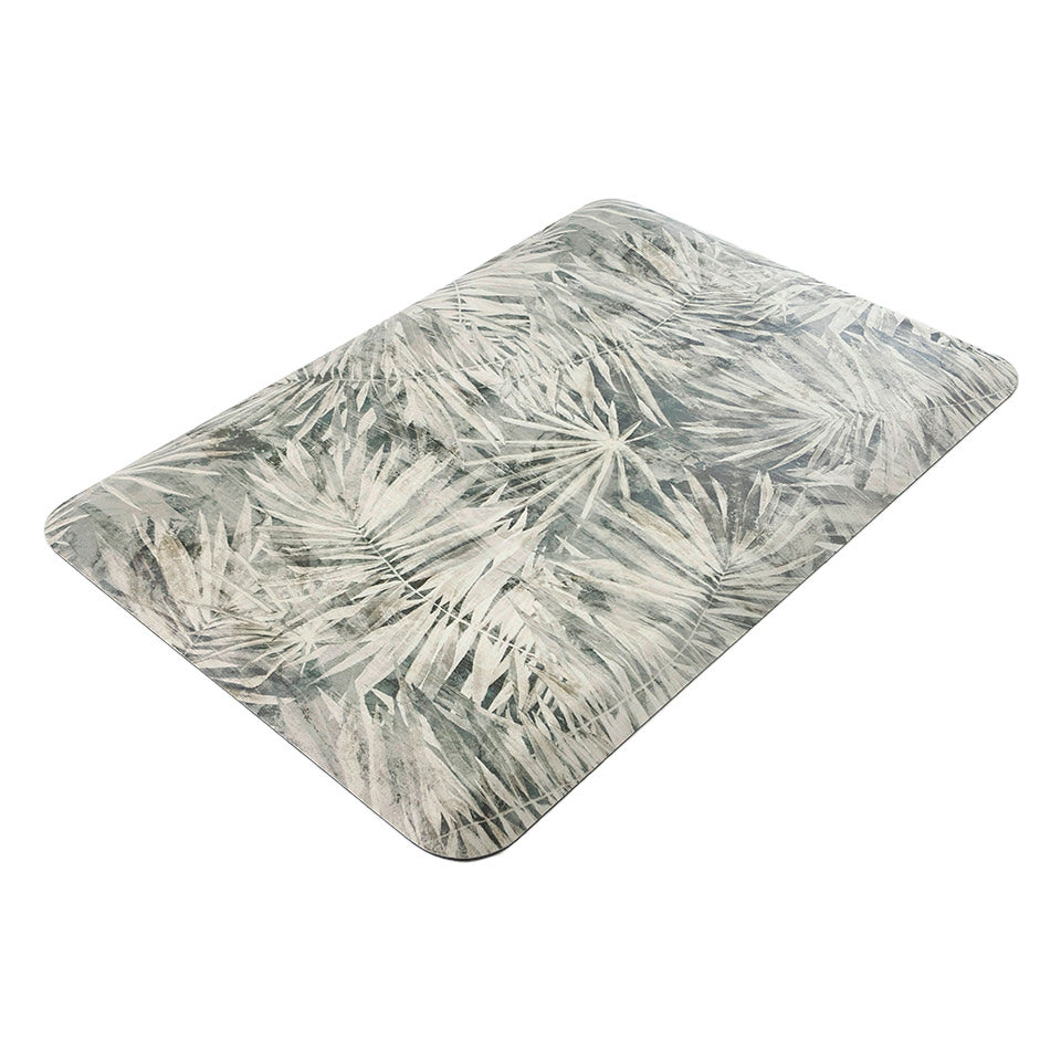 Happy Feet’s Tranquil Palms anti-fatigue small mat at an angle showing for its beveled edges.