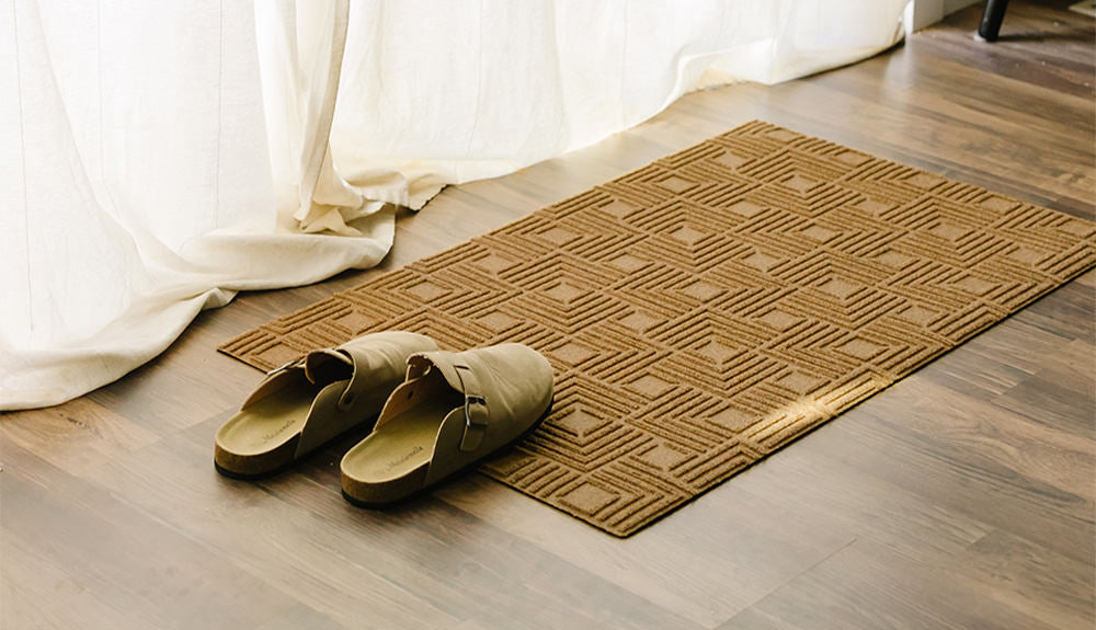 Dreamy image of a wheat Labyrinth mat with a pair on spillers resting on the mat.