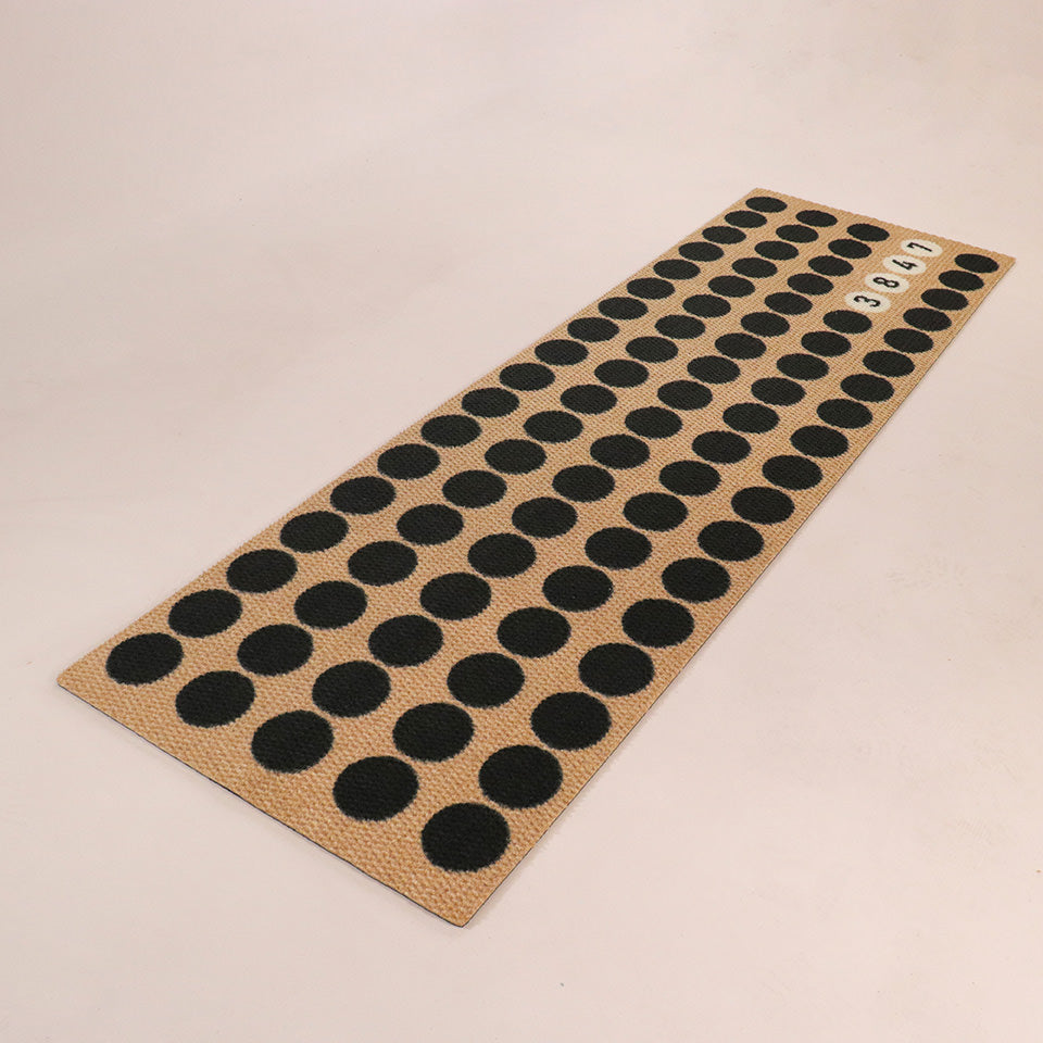 Angled image double door Lucky Numbers mat personalized with street numbers on black white and coir.