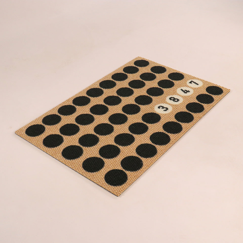 Angled image single door Lucky Numbers mat personalized with street numbers on black white and coir.
