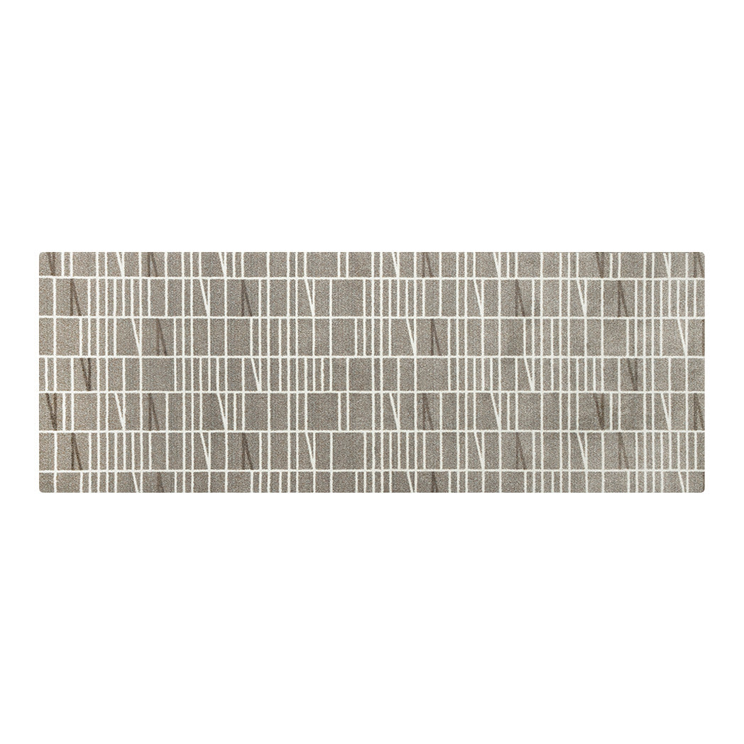 Maxcent Biblioteca runner mat in Light Greige – a long, low-profile rug featuring a soft beige-gray background with off-white lines in a modern grid and angle pattern. Designed with a cushioned carpeted surface and non-slip rubber backing for stable use in hallways, kitchens, or entryways