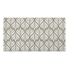Maxcent Botanica area mat in Light Greige, medium size – features a soft brown and gray leaf pattern over a light cream background. The elegant, nature-inspired design adds warmth to any space, while the carpeted surface and non-slip backing combine comfort with stability on hard floors.