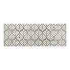 "Maxcent Botanica runner mat in Light Greige – a long rectangular rug with a cream leaf pattern layered over a soft brown-gray background. The subtle contrast adds a touch of elegance to narrow spaces like hallways or kitchens. Designed with a cushioned carpeted surface and non-slip rubber backing for comfort and stability.