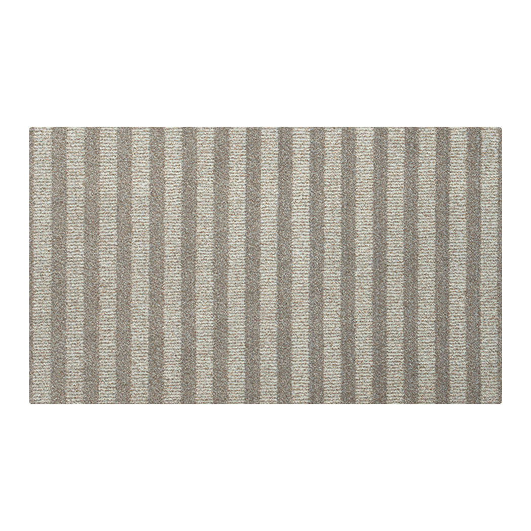 Overhead view of Maxcent Classic Stripe accent mat in light greige with vertical brown stripes—washable, low-profile mat with timeless striped design.