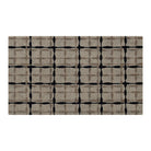 Top-down photo of Maxcent Heritage Tweed accent mat in greige and inkwell — earthy modern plaid with tonal gridlines and rug-inspired detailing.