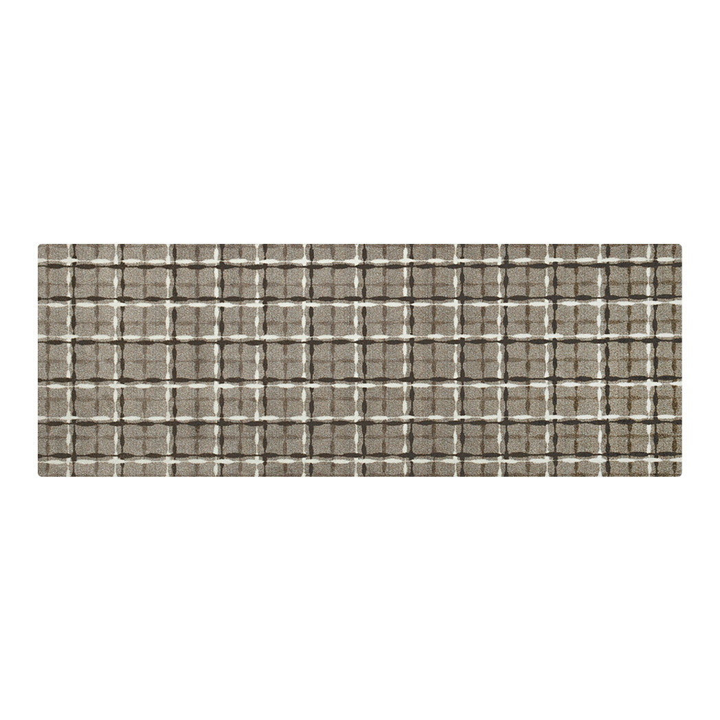 Maxcent Heritage Tweed runner mat in Light Greige – features a warm beige/grey background with a crosshatch pattern in dark brown and off-white, creating a soft, woven grid design. The elongated shape is ideal for hallways or galley kitchens, with a carpeted surface and non-slip rubber backing for added comfort and safety.