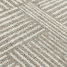 Close-up view of the Maxcent Organic Squares floor mat, highlighting the soft texture and detailed weave of alternating horizontal and vertical stripes in a blend of stone gray and sandy beige tones.
