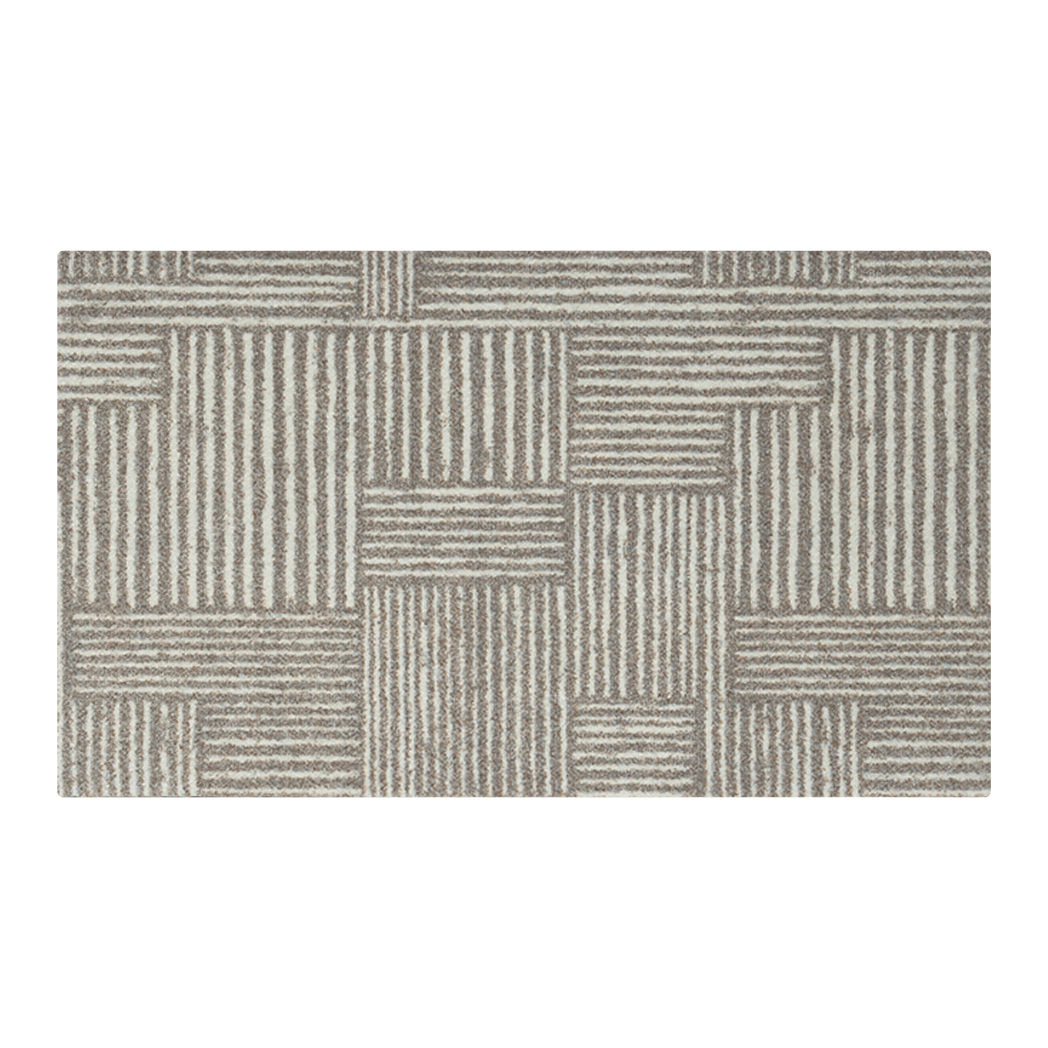A small Maxcent floor mat in Organic Squares design, featuring a modern patchwork of alternating vertical and horizontal warm gray stripes on a soft beige background—ideal for compact spaces like entryways, bathrooms, or kitchen sinks