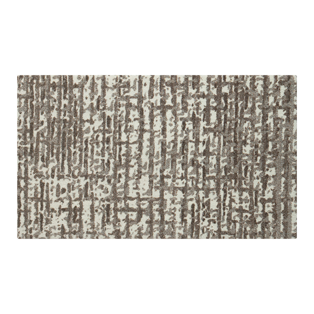 Overhead view of Maxcent Stone Weave accent mat with abstract brown-on-white texture—layered, neutral design with a soft modern edge and mat-grade durability.