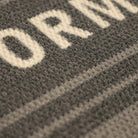 Detailed shot of Modern Moniker’s non shedding surface in light and dark grey.
