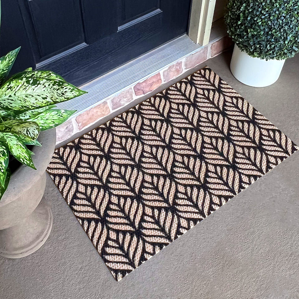 Single door Botinical Neighburly doormat in black and coir featuring a non-shedding surface and low-profile.