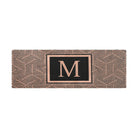 Unique doormats for double doors; the Escher doormat is a unique door mat with a modern geometric design in brown and black with an eye catching letter in the middle.