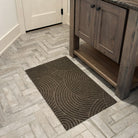 WaterHog Luxe's Put Your Records On single door mat in front of a bathroom vanity protecting the floors
