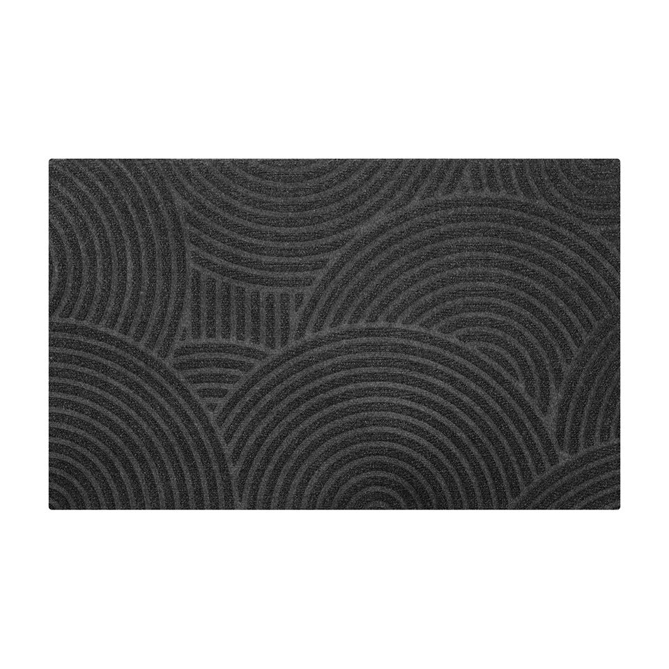 WaterHog Luxe Put Your Records On circular geometric patterned graphite doormat in single door.