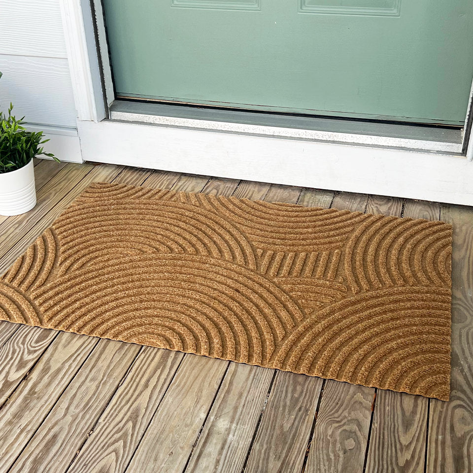 Low-profile, American made WaterHog Luxe Put Your Reconds On entrance door mats with a non-shedding surface.