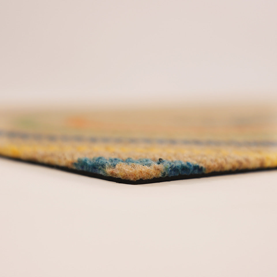 Close-up corner shot of Rainbow Roundabout’s low profile and non shedding surface backed by rubber.
