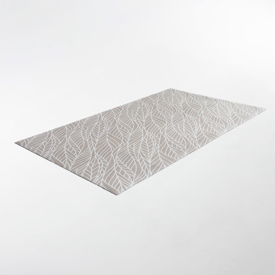 Overhead angled shot of Abstract cream colored leaf pattern on shiitake tan linen look low profile washable floormat