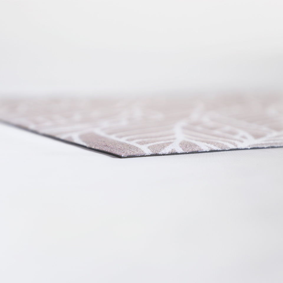 Super low profile view of Abstract cream colored leaf pattern on shiitake tan linen look low profile washable floor mat