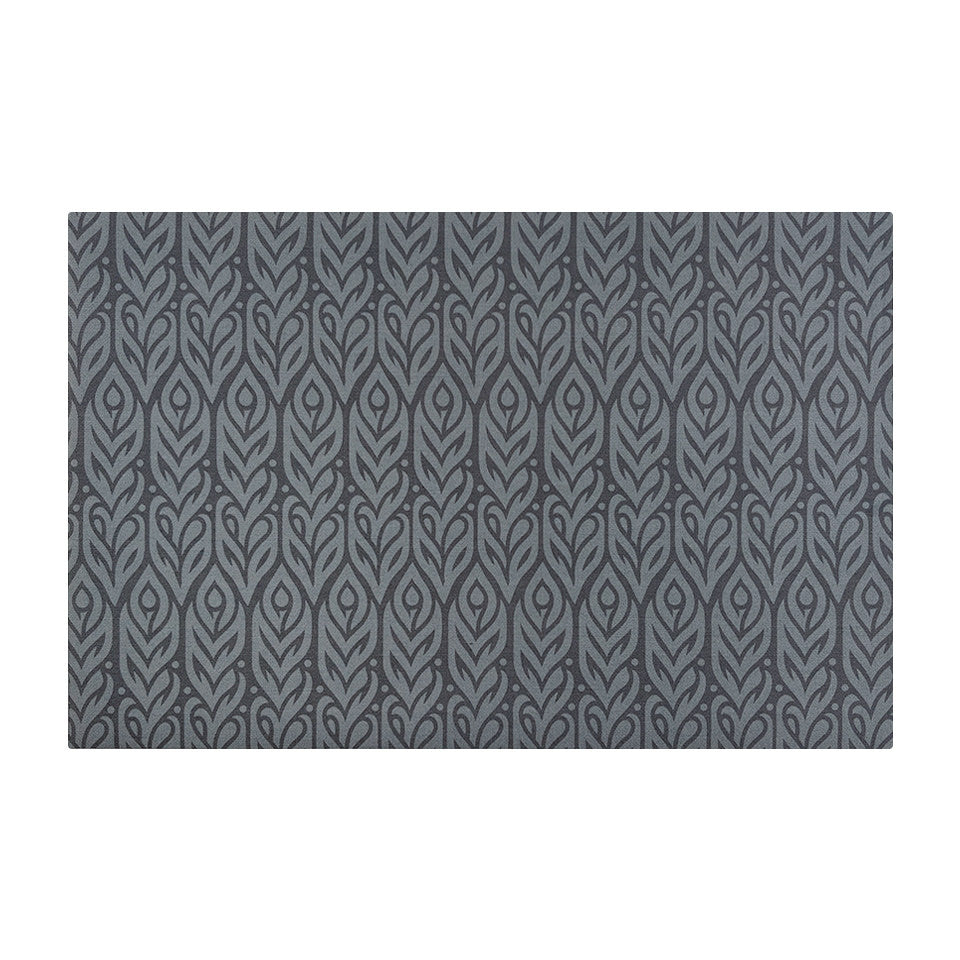 Overhead image of Un-Rug Color Washed Quill mat in the size small with a feathery design in blue hues.