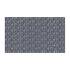 Overhead image of Un-Rug's Ditsy Floral medium mat in a floral sage design on a navy background.