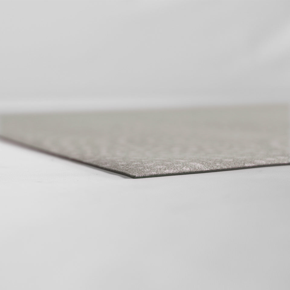 Super low profile corner shot of Shiitake tan colored linen background with white dotted fan design on a low profile washable floor mat