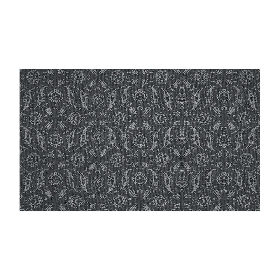 Overhead image of Un-Rug's medium sized Filigree Floral mat with an oriental inspired design.