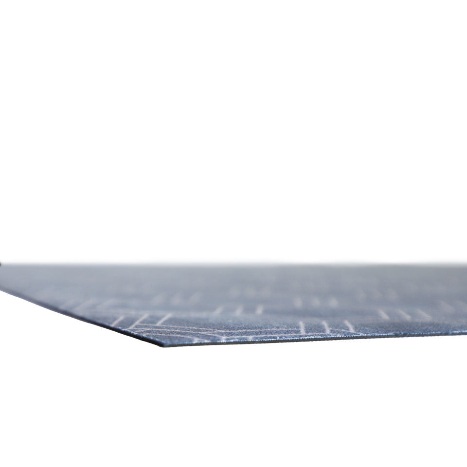 Super low profile shot of Storm cloud blue linen look with double honeycomb accent design in shiitake tan printed on a low profile washable indoor floor mat