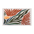 Medium MCM abstract floral, shiitake tan background and orange and yellow flowers with leaves on low profile washable mat