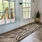 MCM funky abstract floral hallway runner with urbane bronze background and shiitake tan flowers on low profile washable floor mat